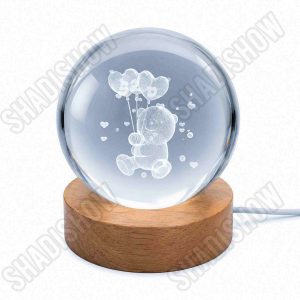 گوی شیشهای لیزری طرح خرس تدی نشسته با بادکنکهای قلبی نور مولتی و تک رنگ